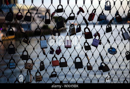 Rotterdam, Netherlands. June 29, 2019. Padlocks locks on love bridge. Blur background, closeup. Stock Photo