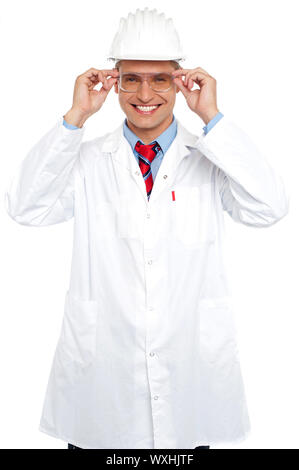 Smiling architect holding eyeglasses isolated on white background Stock Photo