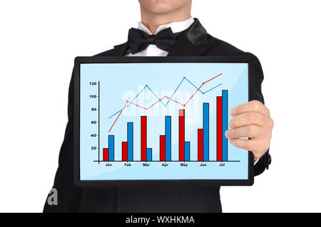 businessman in tuxedo holding tablet with business chart Stock Photo