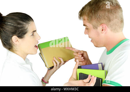 A couple of teens discussing study lessons Stock Photo