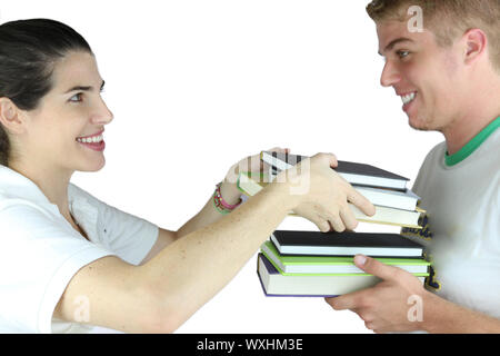 A couple of teens discussing study lessons Stock Photo