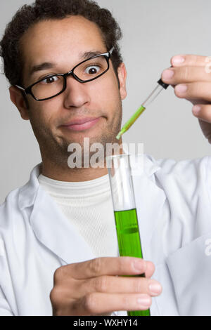 Crazy scientist doing experiment Stock Photo