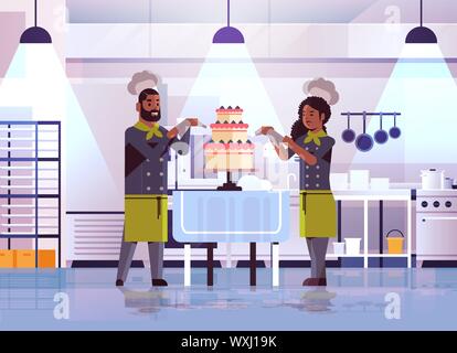 professional pastry chefs couple decorating tasty wedding cream cake african american woman man in uniform cooking food concept flat modern restaurant Stock Vector