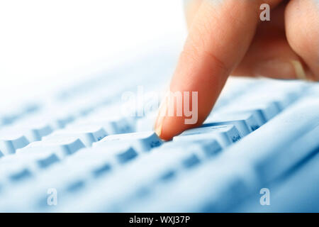 girl hands typing on keyboard macro close up Stock Photo