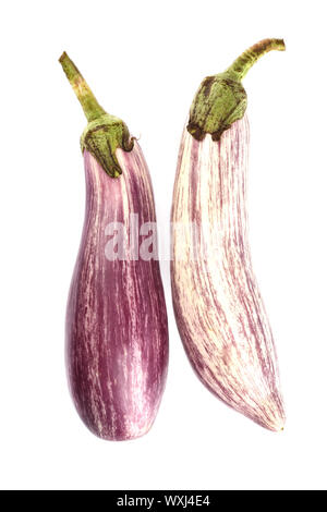 Two eggplants graffiti isolated over white background. The outer skin is striped with violet with ivory white. Top view. Stock Photo