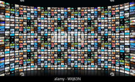 Large interactive TV with many smart channels on black background Stock Photo