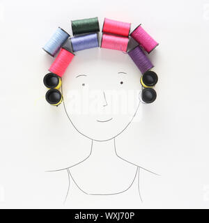 Conceptual woman with curlers in her hair Stock Photo