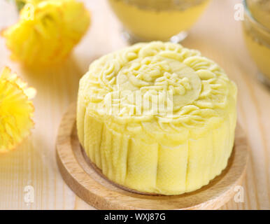 Snowy skin mooncakes.  Traditional Chinese mid autumn festival food. The Chinese words on the mooncakes means lotus paste, not a logo or trademark. Stock Photo