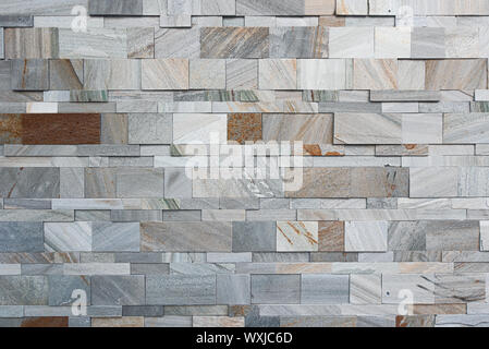 Split modern artificial grey and brown marble wall texture Stock Photo