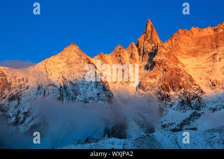 The mountain Aiguille de la Tsa (3668 m) in evening light. Valais, Switzerland Stock Photo