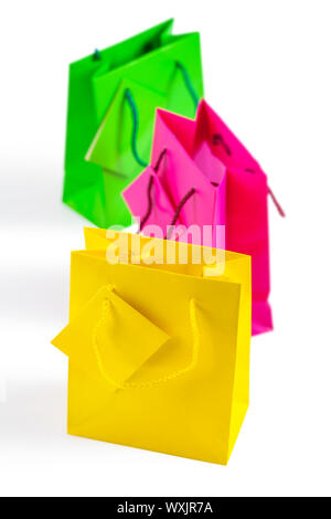 three colored isolated paper bags Stock Photo