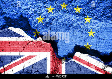Brexit, Flags of the United Kingdom and the European Union on cracked background Stock Photo
