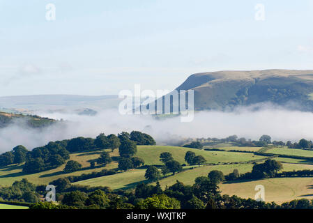 Builth Wells, Powys, UK. 17th September 2019. Mist hangs in the valleys near Builth Wells in Powys, UK. after a cold night with temperatures dropping to aroun 7 deg C. © Graham M. Lawrence/Alamy Live News. Stock Photo