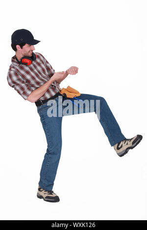 Man faking to pull a rope. Stock Photo