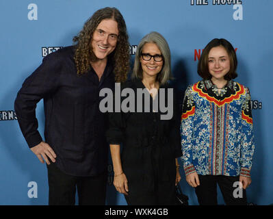 Hollywood, California, USA. 16th Sep, 2019. 'Weird Al' Yankovic and his wife Suzanne Yankovic and their daughter Nina Yankovic attends the premiere of the motion picture comedy 'Between Two Ferns: The Movie' at the ArcLight Cinerama Dome in the Hollywood section of Los Angeles on Monday, September 16, 2019. Storyline: Zach Galifianakis dreamed of becoming a star. But when Will Ferrell discovered his public access TV show 'Between Two Ferns' and uploaded it to Funny or Die, Zach became a viral laughing stock. Now Zach and his crew are taking a road trip to complete a series of high-profile cele Stock Photo