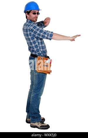 Laborer gesturing Stock Photo