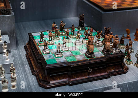 MUNICH, GERMANY - NOVEMBER 27, 2018 : The Represents an exposition of the history of the development of board games chess backgammon poker in the Bava Stock Photo