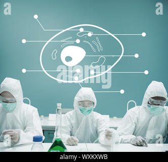 Lab workers experimenting in the lab with cell diagram in background Stock Photo