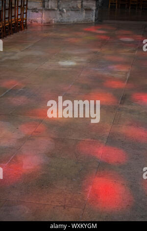 Coloured light from stained glass on floor of church. Troyes, France. Stock Photo
