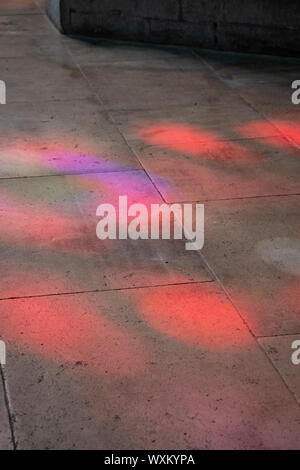 Coloured light from stained glass on floor of church. Troyes, France. Stock Photo