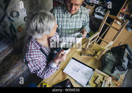 Senior couple in their carpentry Stock Photo