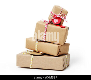 Stack of handcraft gift boxes on white background Stock Photo