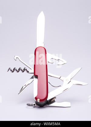 closeup of a swiss knife in white background Stock Photo