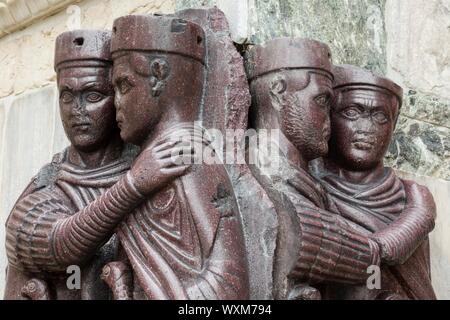 Portrait of the Four Tetrarchs, detail of a stone sculpture outside St Mark's Basilica, Venice, Italy Stock Photo