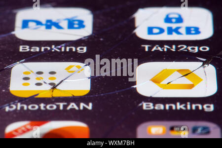 Berlin, Germany. 15th Sep, 2019. The logos of the banking apps of DKB and Commerzbank with the corresponding TAN apps can be seen on the defective display of a smartphone. Credit: Soeren Stache/dpa-Zentralbild/ZB/dpa/Alamy Live News Stock Photo