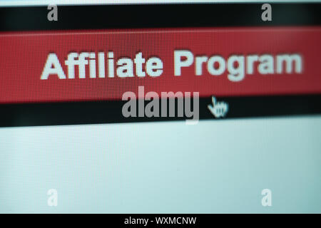 Close up Red button affiliate program on a  white background. Stock Photo