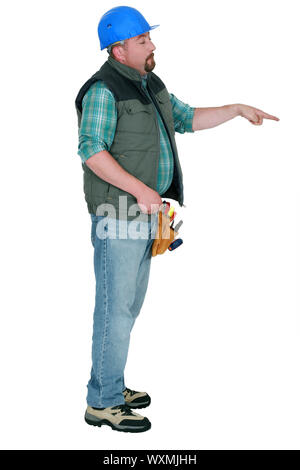 Laborer gesturing on white background Stock Photo