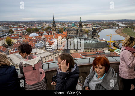 Tourists on the Frauenkirche viewing platform look out over the city in Dresden, Germany Stock Photo