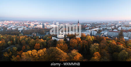Aerial panorama of fall foliage and the city center with Turku Cathedral at autumn morning in Turku, Finland Stock Photo