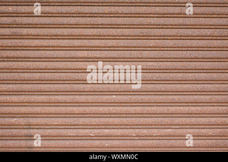 Background of metal brown wall in grungy style. Stock Photo
