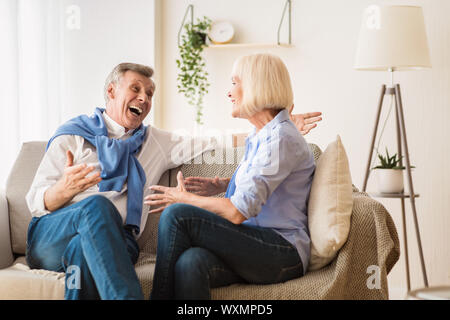 Pleasant conversation. Mature couple spending time together Stock Photo
