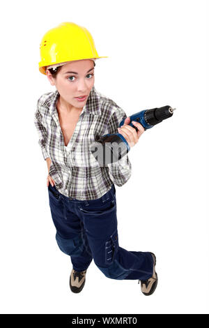 Tradeswoman holding a battery-powered power tool Stock Photo