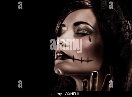 Evil witch on black background Stock Photo