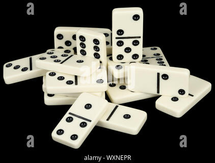 Small group from dominoes counters on a black background Stock Photo