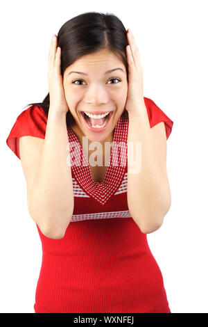 Happily surprised woman holding her head in amazement. Isolated on white. Stock Photo