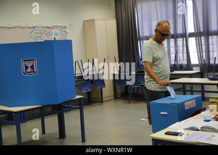 Jerusalem, Israel. 17th Sep, 2019. A man casts his ballot at a polling station in Tel Aviv, Israel, Sept. 17, 2019. The second Israeli parliamentary elections in five months are underway on Tuesday and will decide whether the nation's longest-serving prime minister, Benjamin Netanyahu, could stay in power. Credit: Gil Cohen Magen/Xinhua Stock Photo