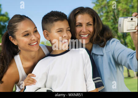 Family Using Digital Camera Stock Photo