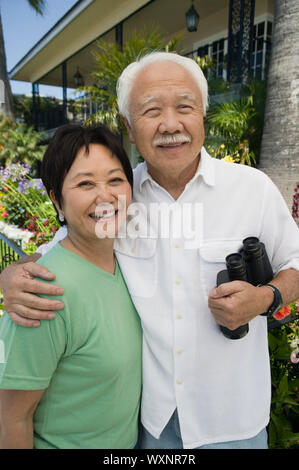 Couple with Binoculars Stock Photo