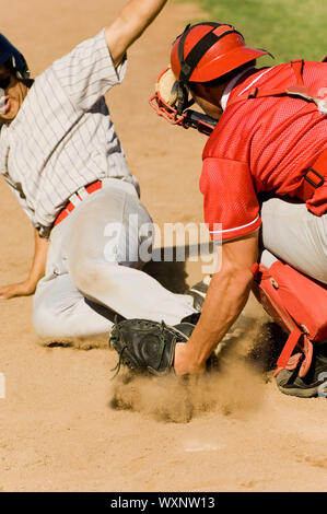 Close Play at Home Plate in Baseball Game Stock Photo