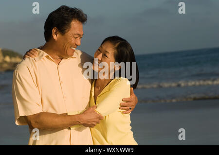 Happy Couple on Beach Stock Photo