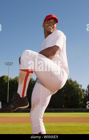 Pitcher Winding Up To Throw Stock Photo