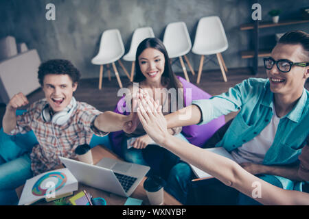 Successful unity, company progress, winning. Four adorable smart Stock Photo