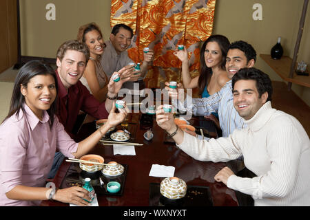 Friends Dining Out Together Stock Photo