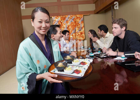 Friends Dining Out Together Stock Photo