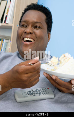 Man Eating Cake Stock Photo