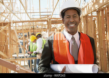 Surveyor on Construction Site Stock Photo